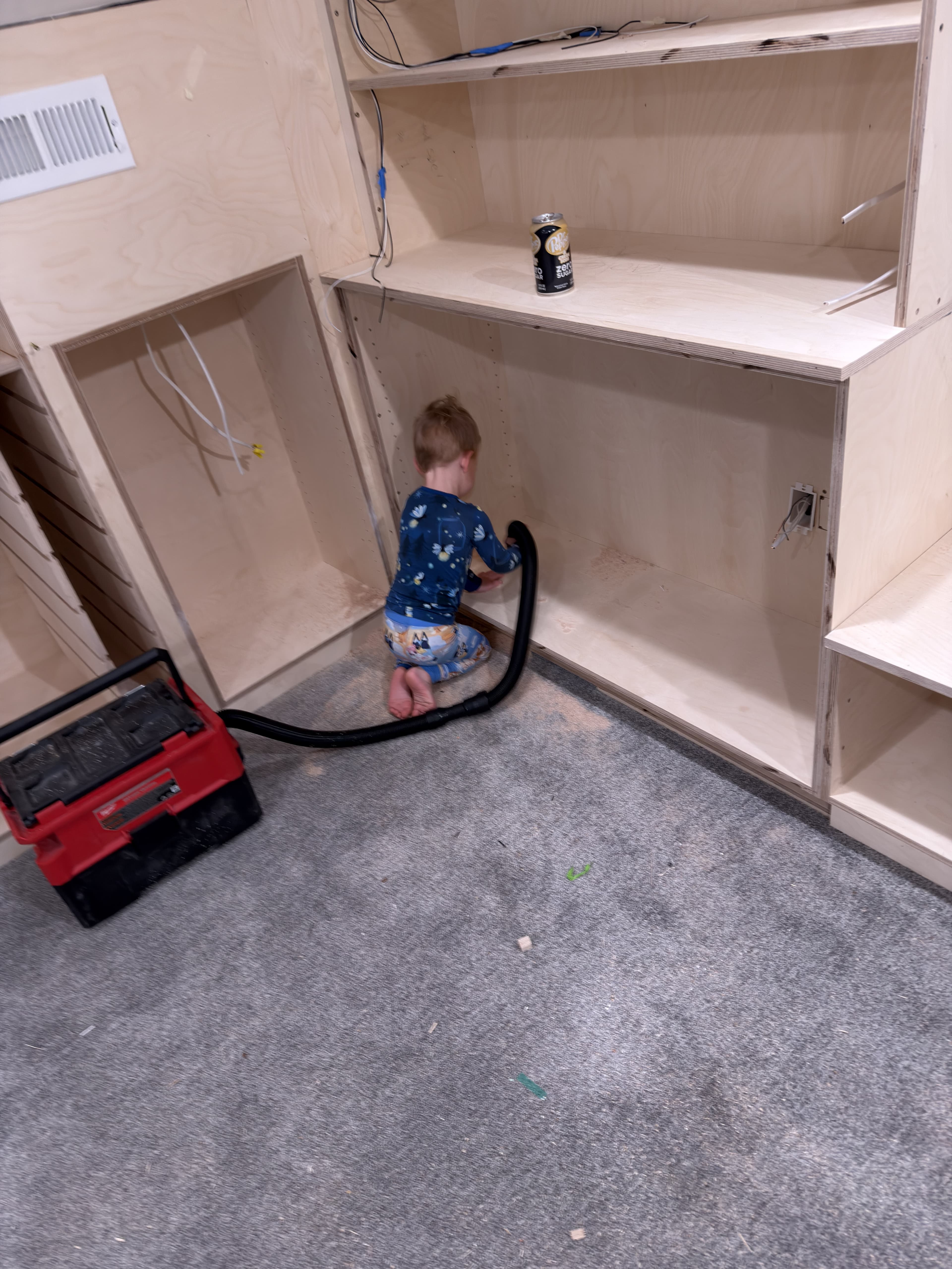 Ashton helping vaccum